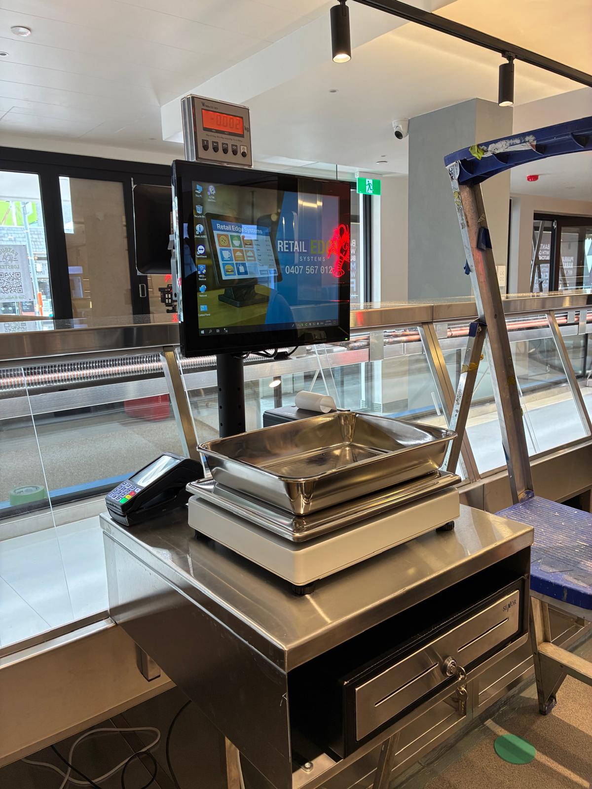 Fish shop POS system with integrated weighing scale